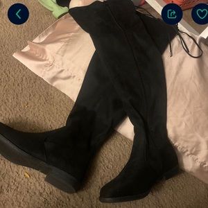 Women’s high black boots new in box